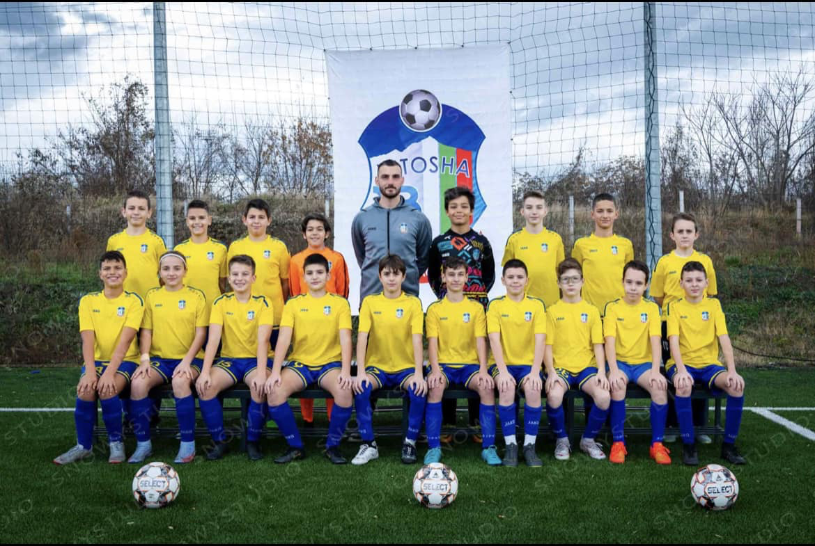 Youth team in yellow jerseys